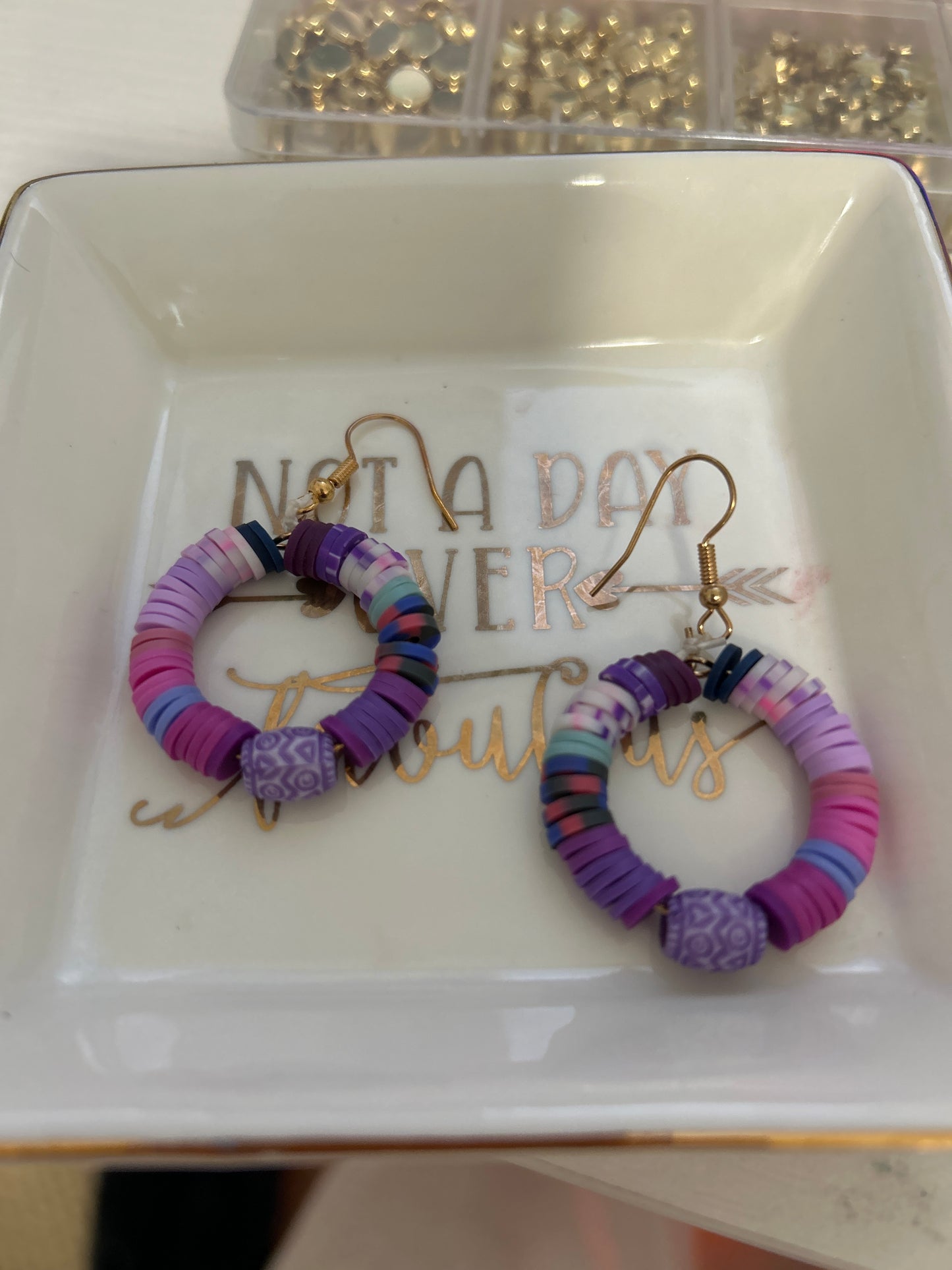 Purple our ears earrings